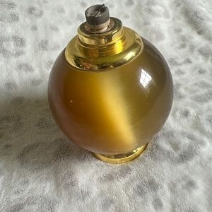 Vintage tiger eye candle light, oil